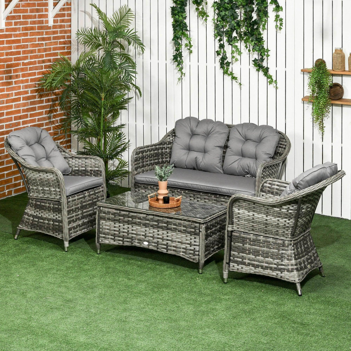 Grey outdoor sofa set with tufted cushions and matching coffee table, 4-piece