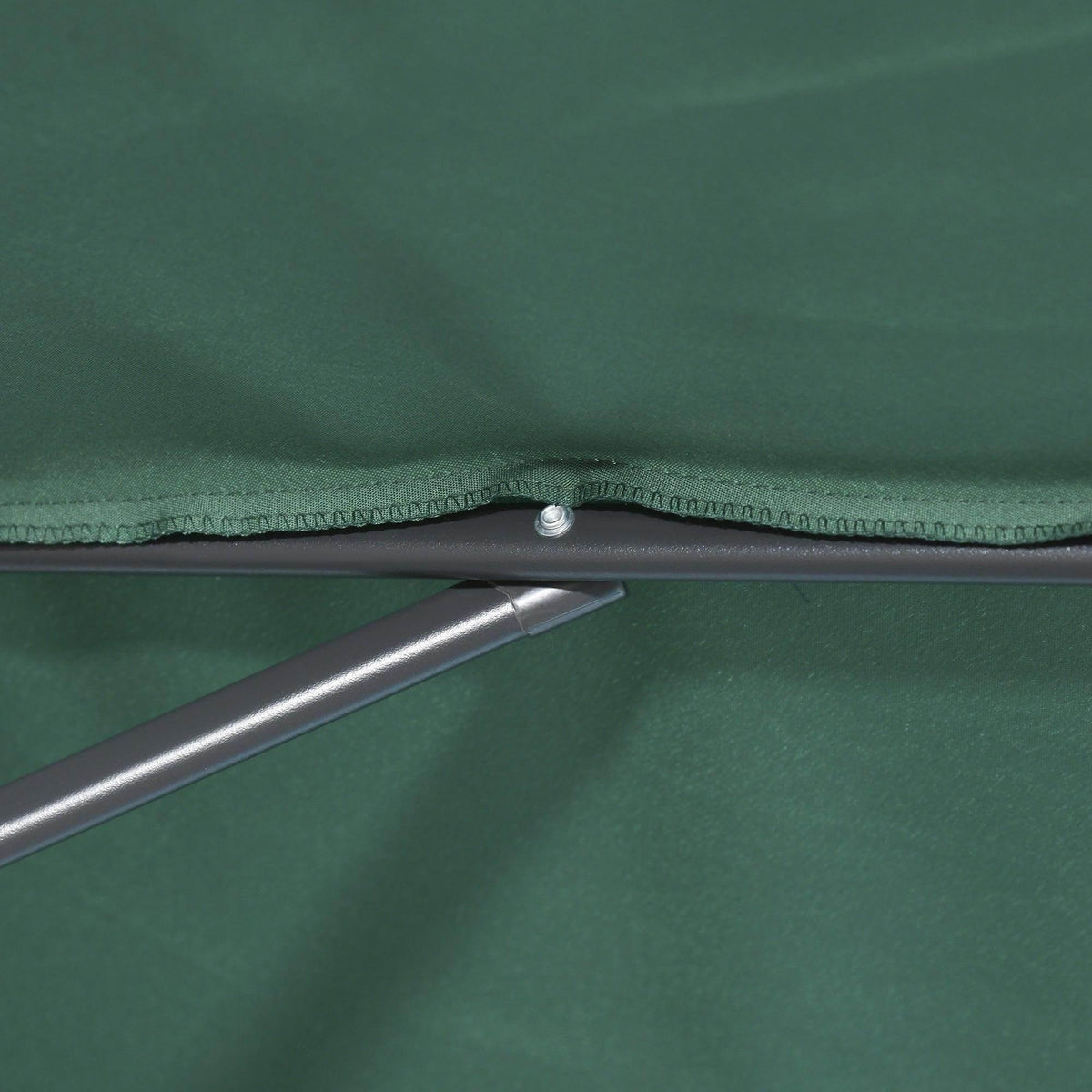 Green half parasol umbrella fabric with reinforced seam and metal support arm