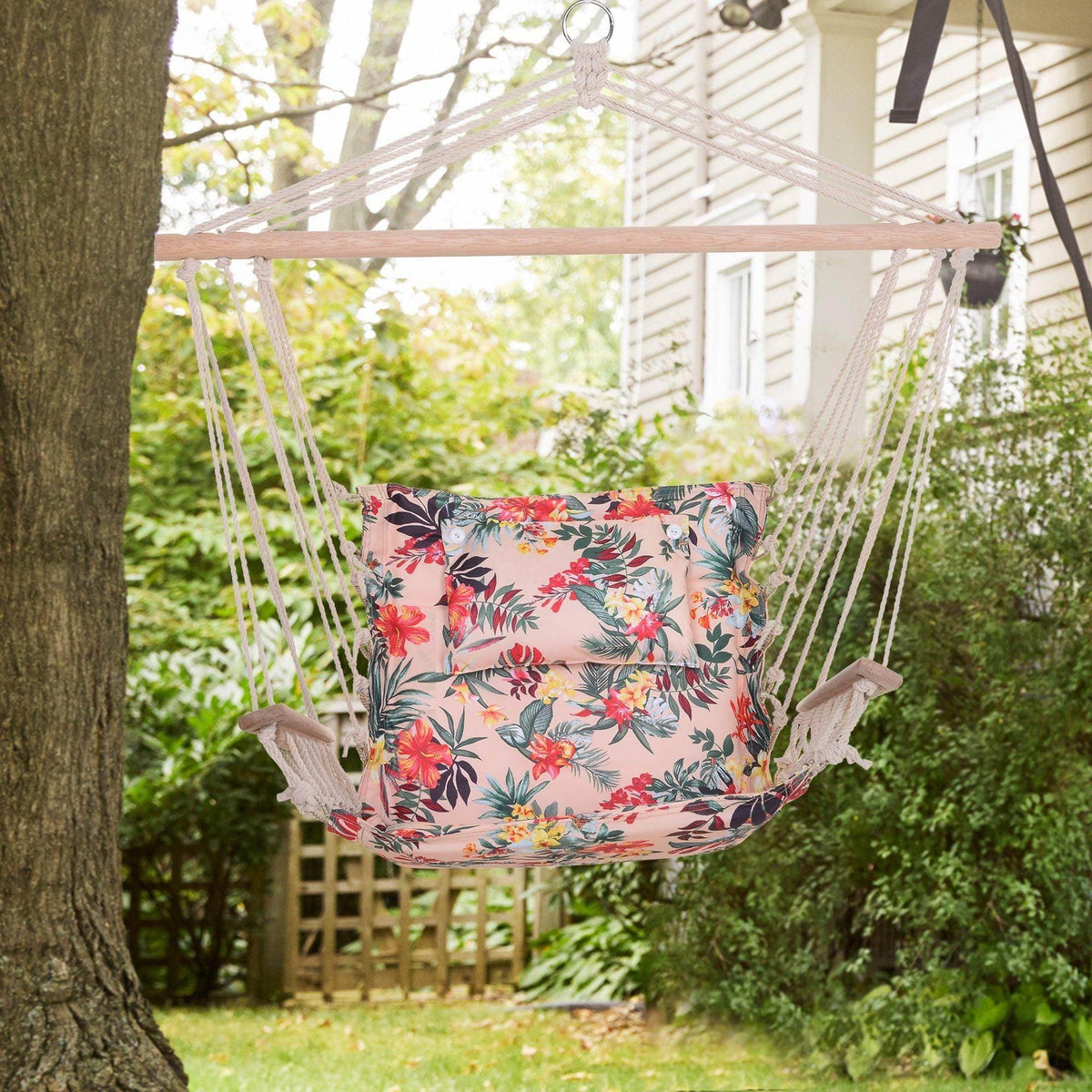 Hanging hammock chair with floral padded seat and backrest cushions