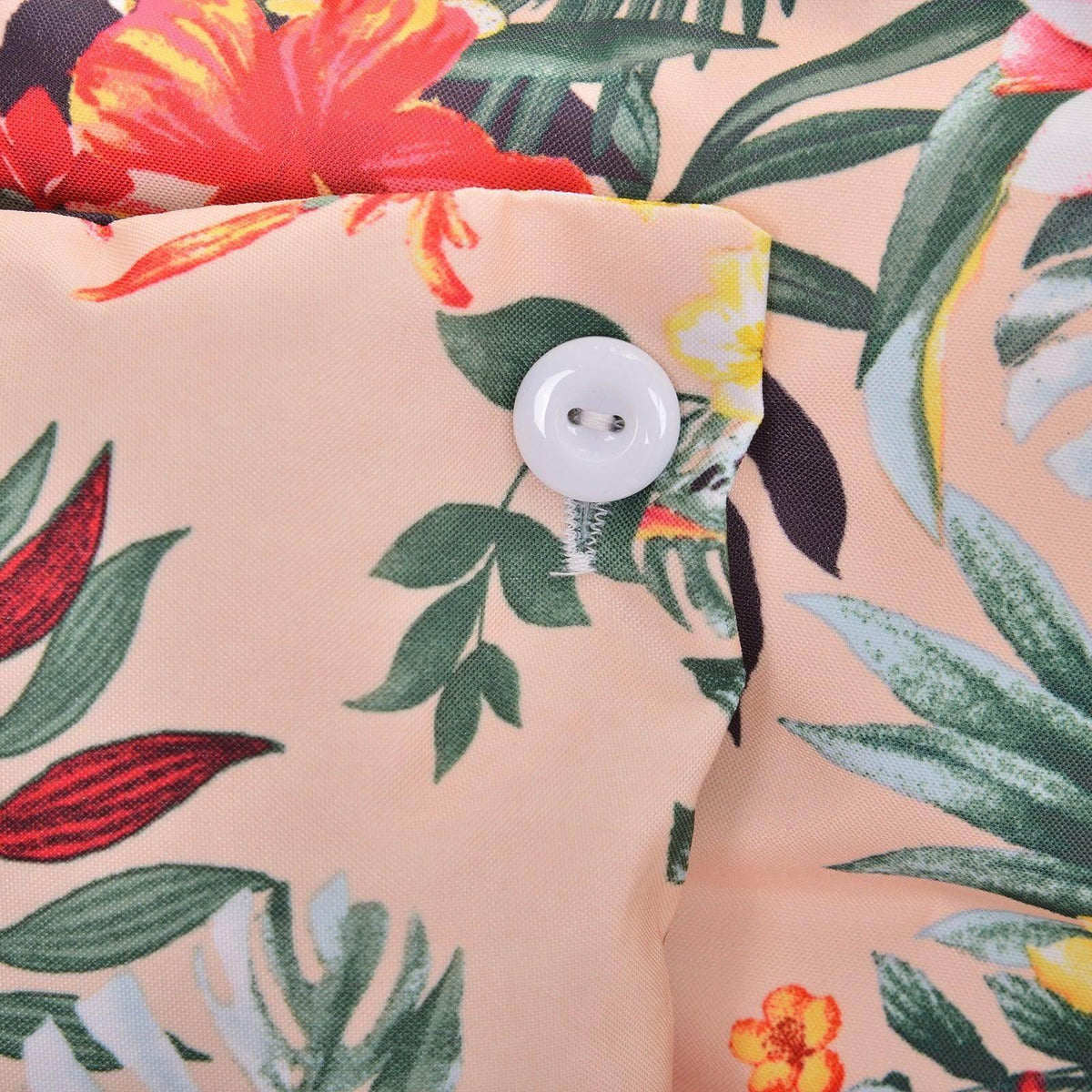 Floral hammock pillow detail with white button closure