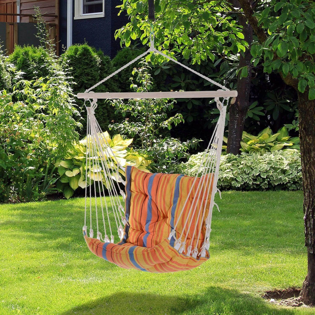 Orange striped hanging hammock chair with padded seat and matching cushions