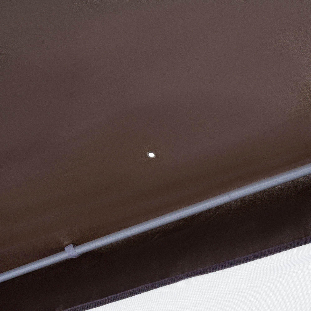 Brown gazebo roof fabric with stitched seam and silver metal support bar