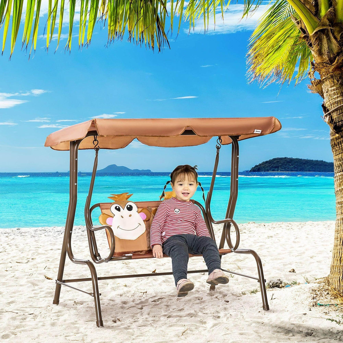 Kids swing chair with tan adjustable canopy and cartoon cow seat back panels
