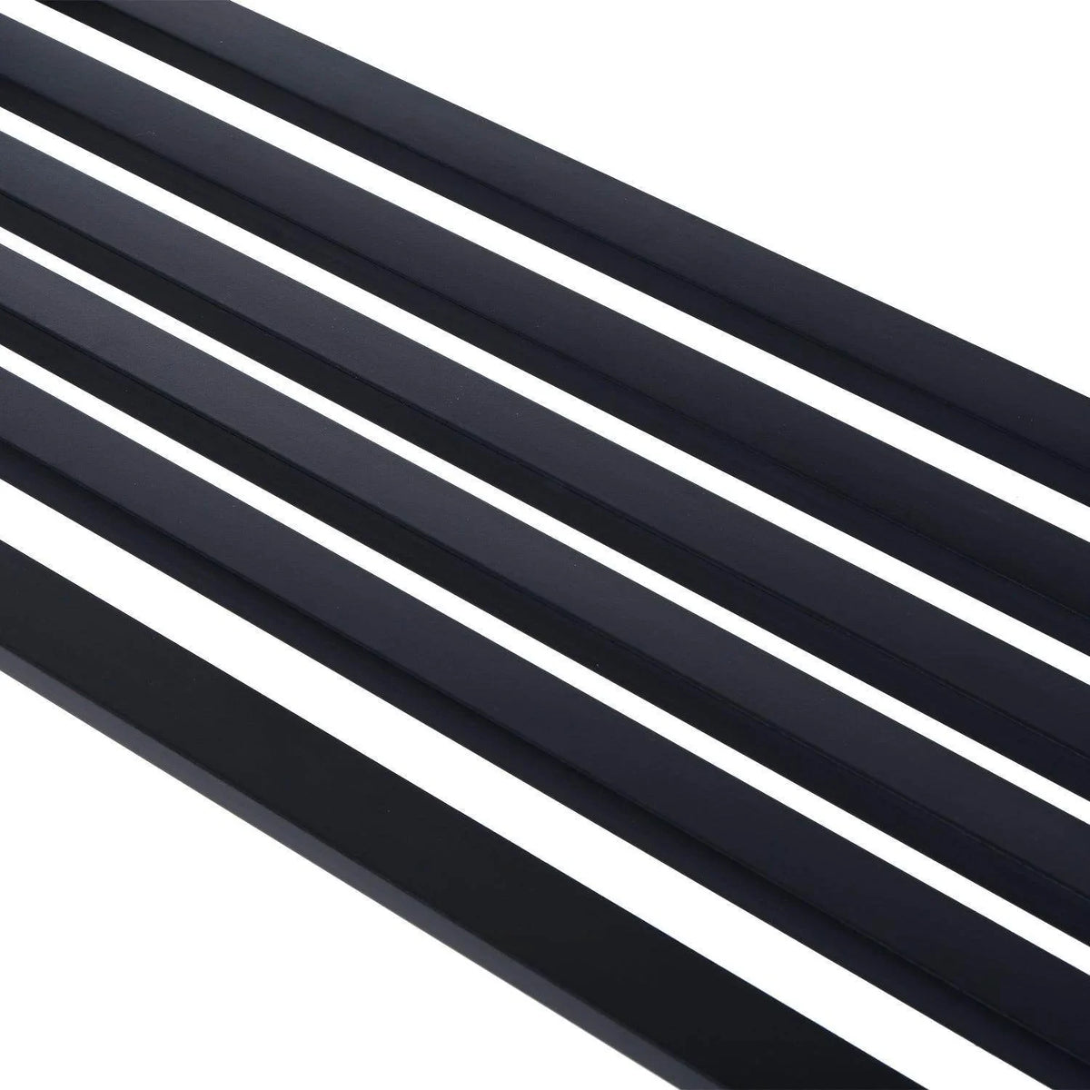 Close-up of black slatted metal seat with evenly spaced horizontal bars