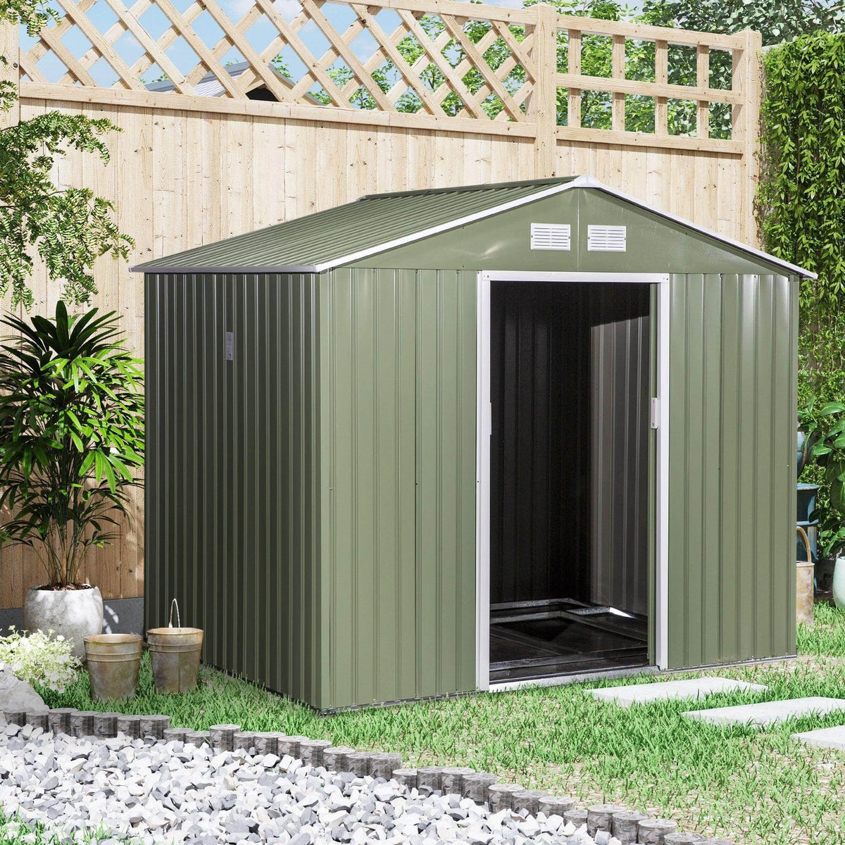 Green metal garden storage shed with corrugated roof and open double sliding door