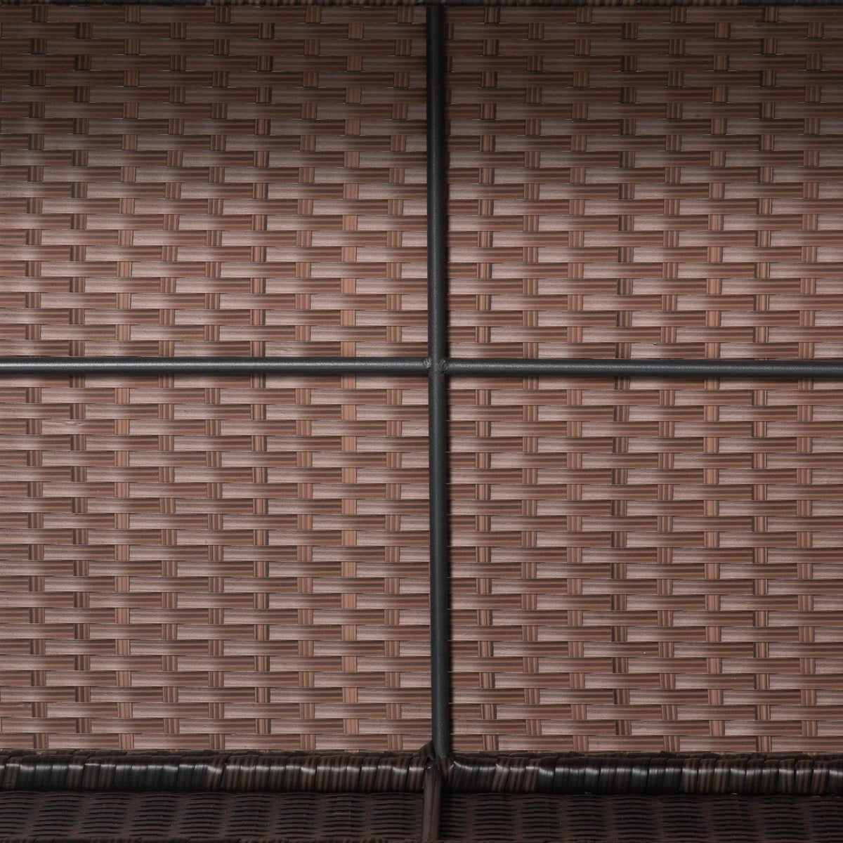 Mixed brown rattan coffee table leg and woven side panel close-up