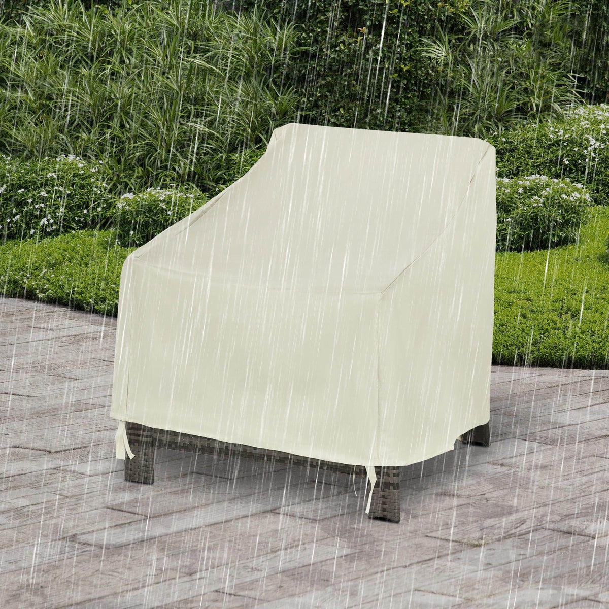 Waterproof outdoor chair cover in light cream, draped over a chair with fitted base.
