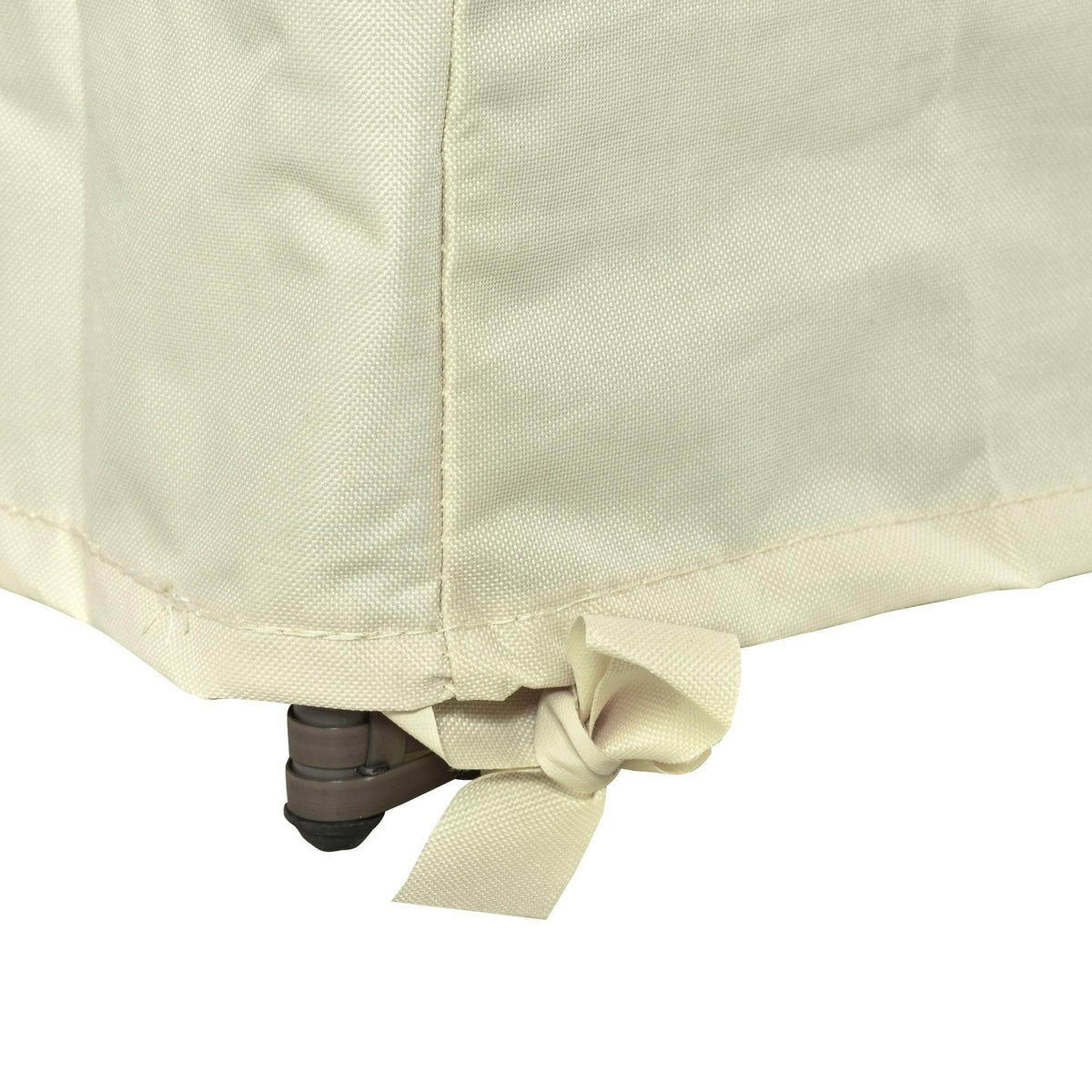 Light cream outdoor chair cover corner with tied fabric strap securing the bottom edge.