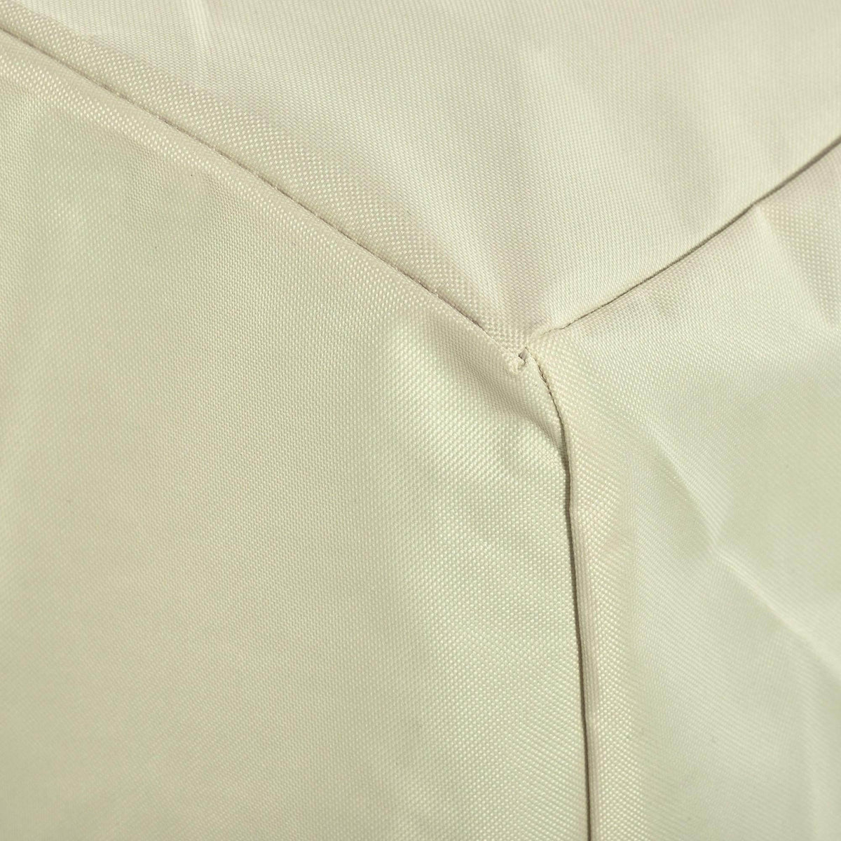 Light cream outdoor chair cover close-up of double-stitched seam at the corner.