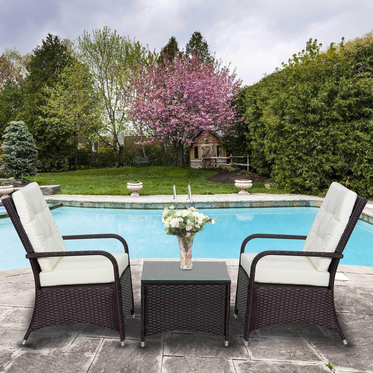 3-piece outdoor rattan bistro set with dark brown woven chairs and glass-top table