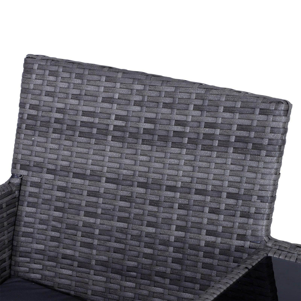 Grey rattan loveseat backrest with woven lattice texture and padded seat cushions