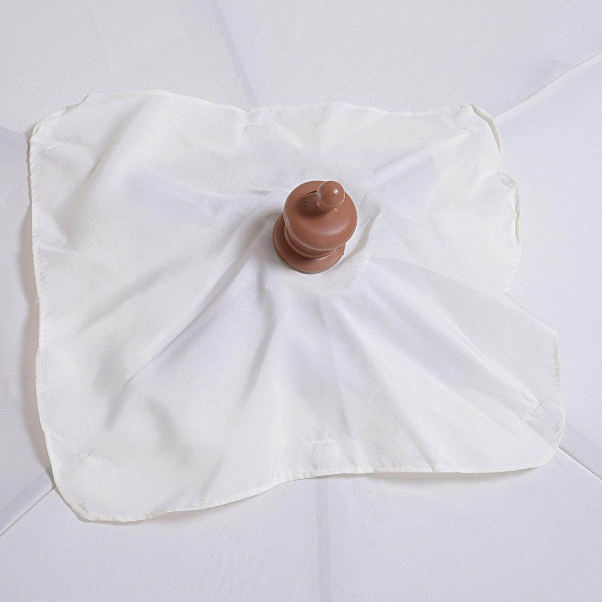 Cream white umbrella canopy top with round finial and gathered fabric