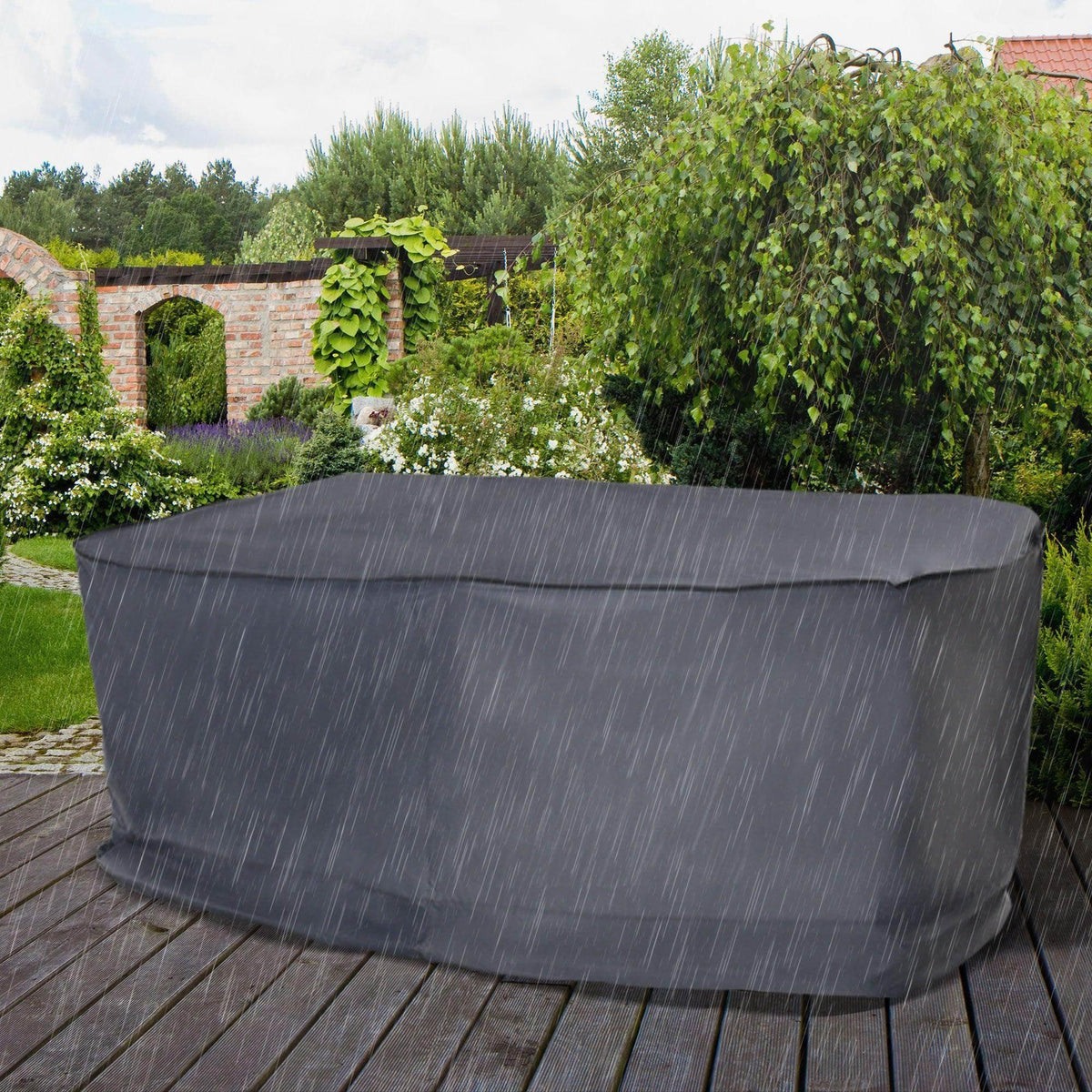 Dark gray outdoor sofa cover with rounded top, waterproof fabric and snug fit.