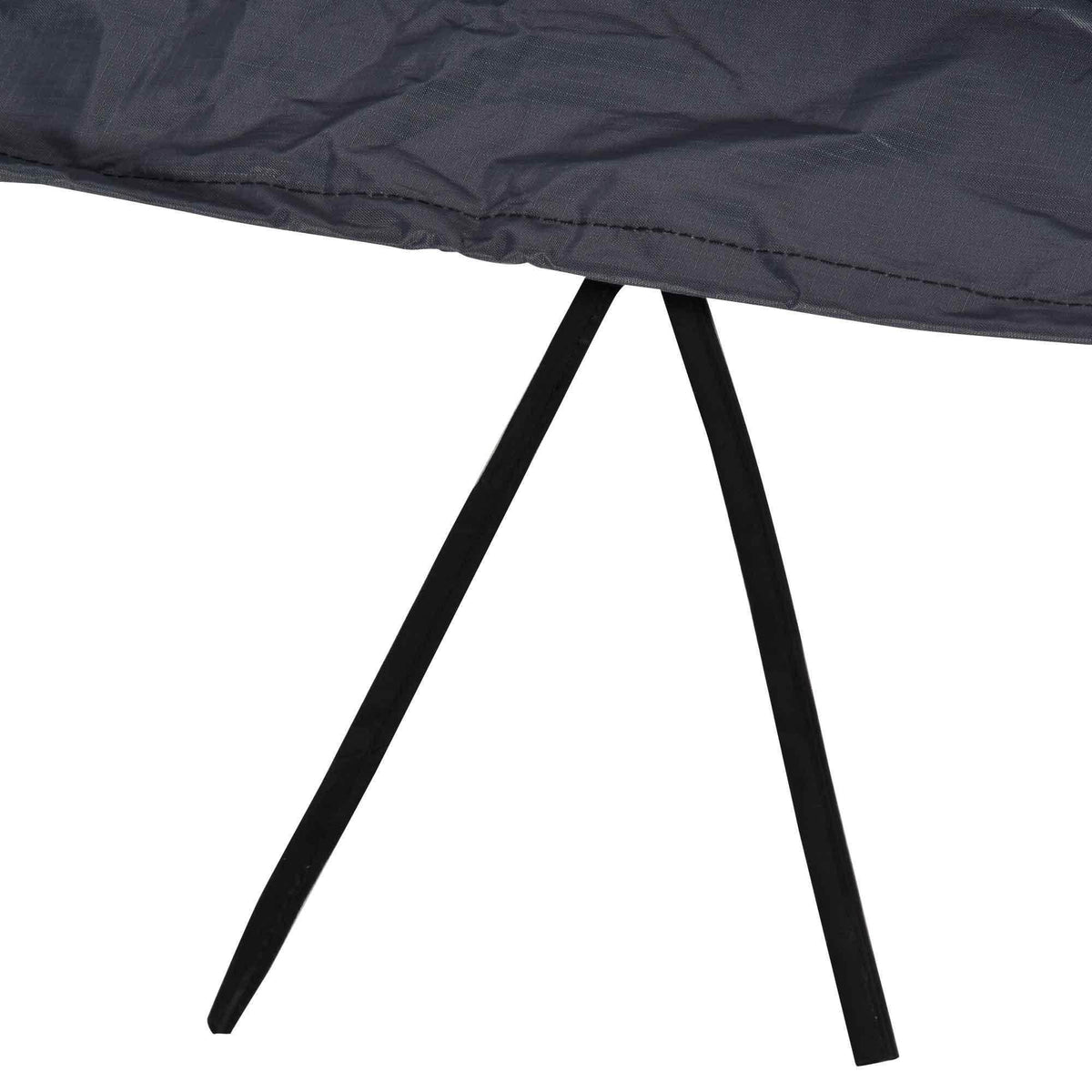 Dark gray sofa cover draped over furniture legs with elastic edge for a tight fit.