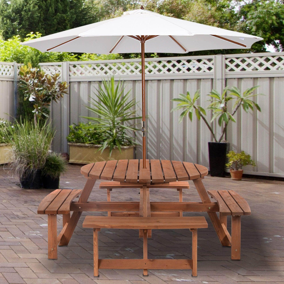 Wooden outdoor picnic table set with umbrella pole and attached benches