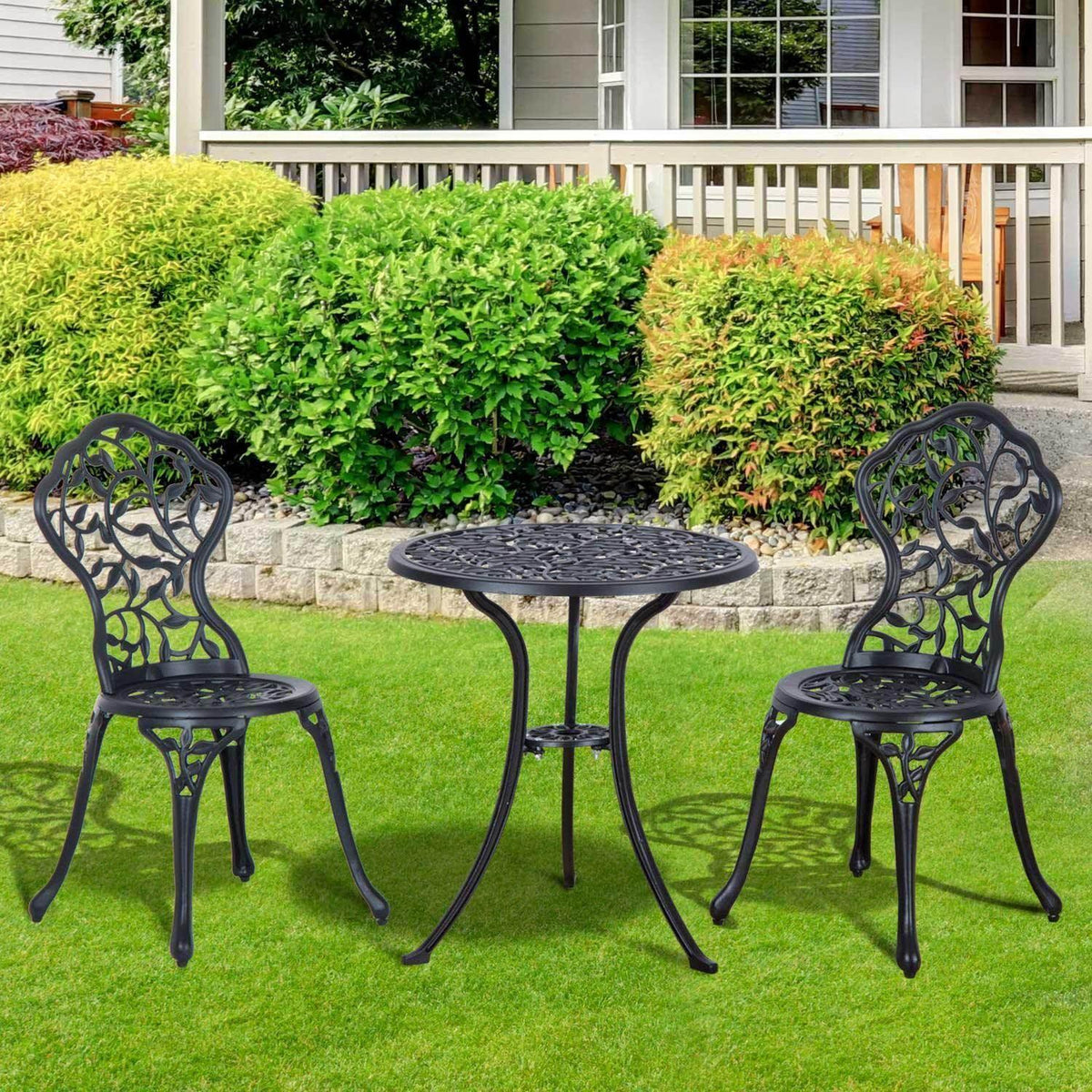 Outdoor bistro table with two matching chairs, round lattice tabletop and scroll-style backs