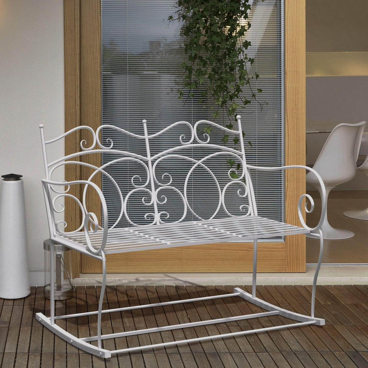 Patio rocking loveseat chair with white metal scroll backrest and slatted seat