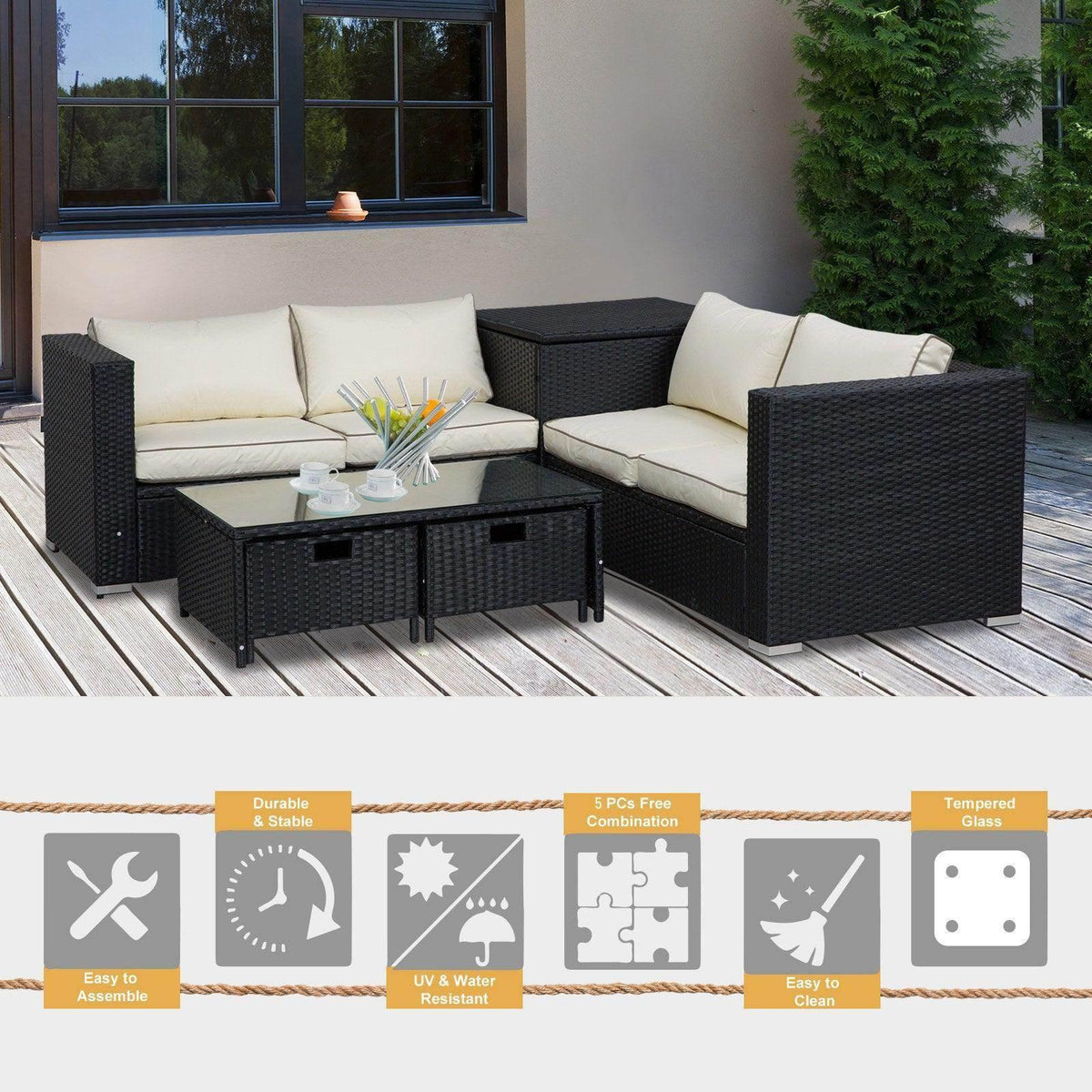 Black outdoor corner sofa set with cream cushions and matching rectangular table