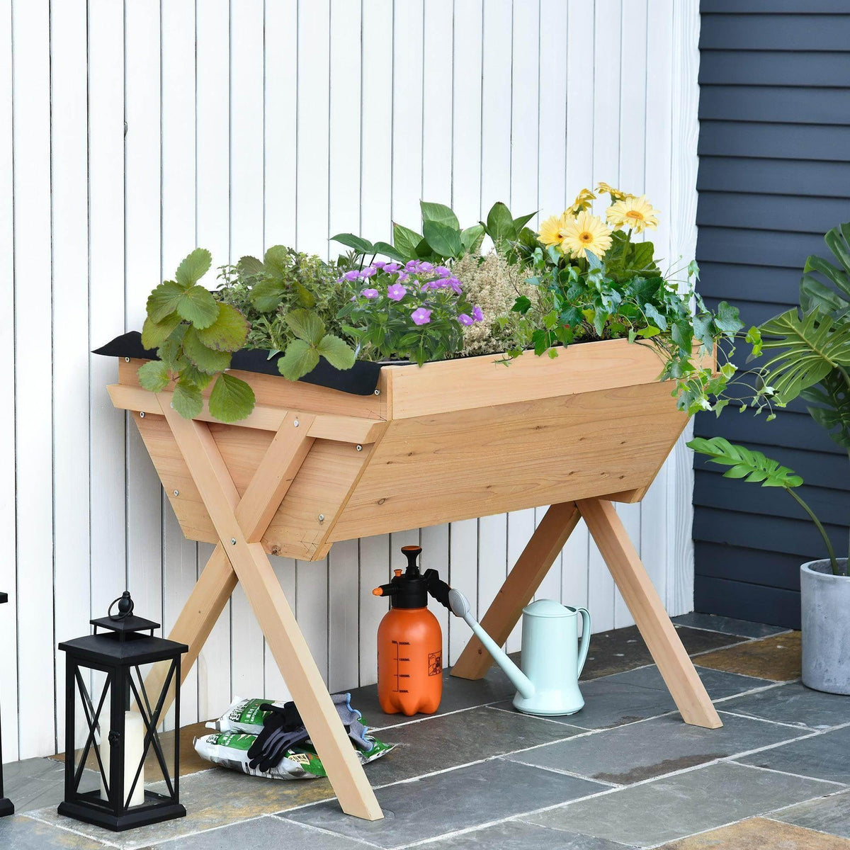 Outsunny raised garden bed box with wooden sides and black liner, front cross supports