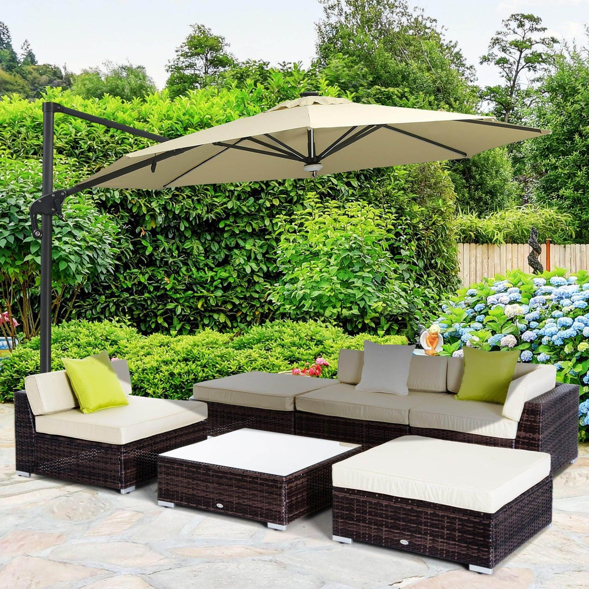 Outdoor rattan sofa set with dark brown wicker frame, cream cushions, and umbrella table