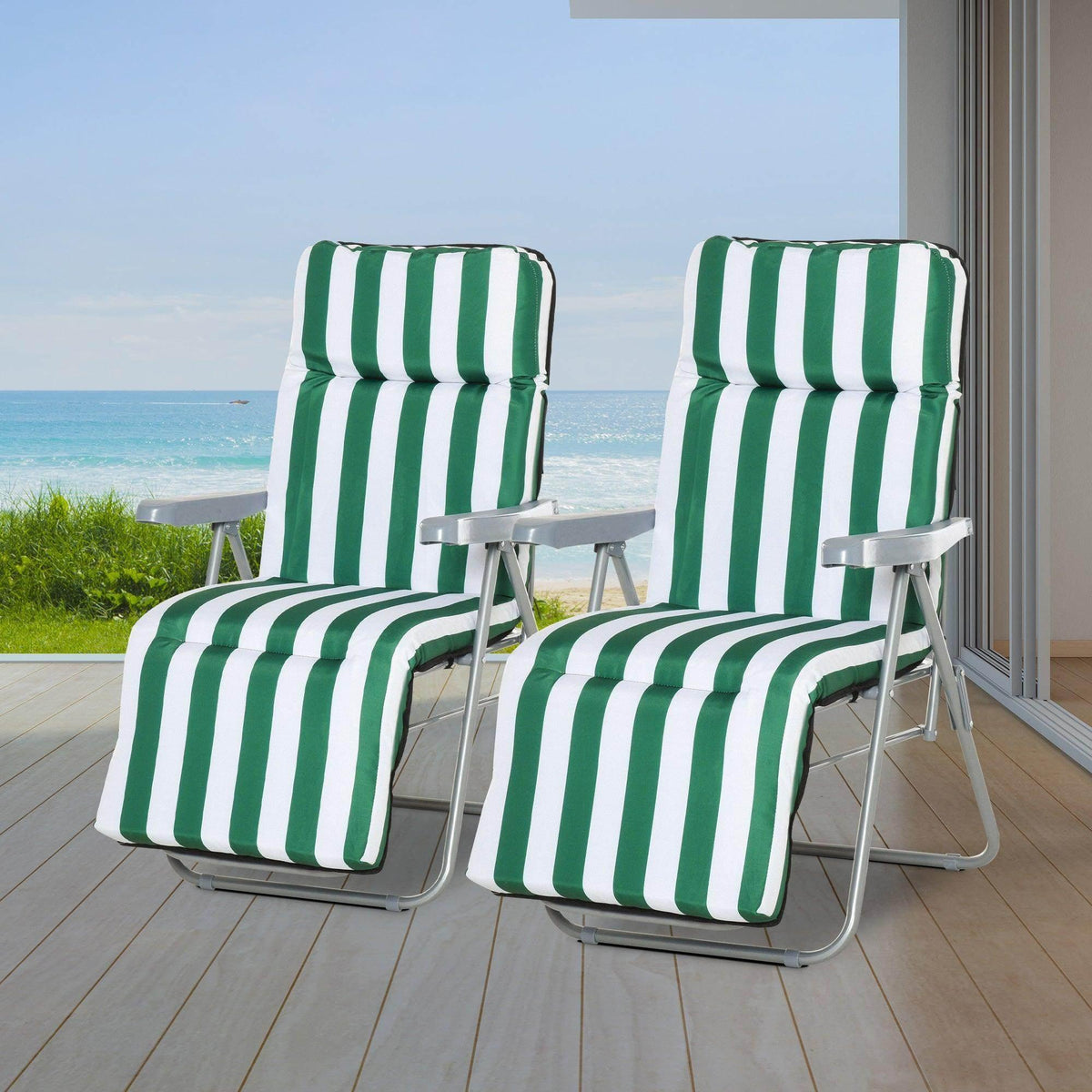 Green and white striped outdoor lounge chairs on deck with ocean view, perfect for garden or patio relaxation.