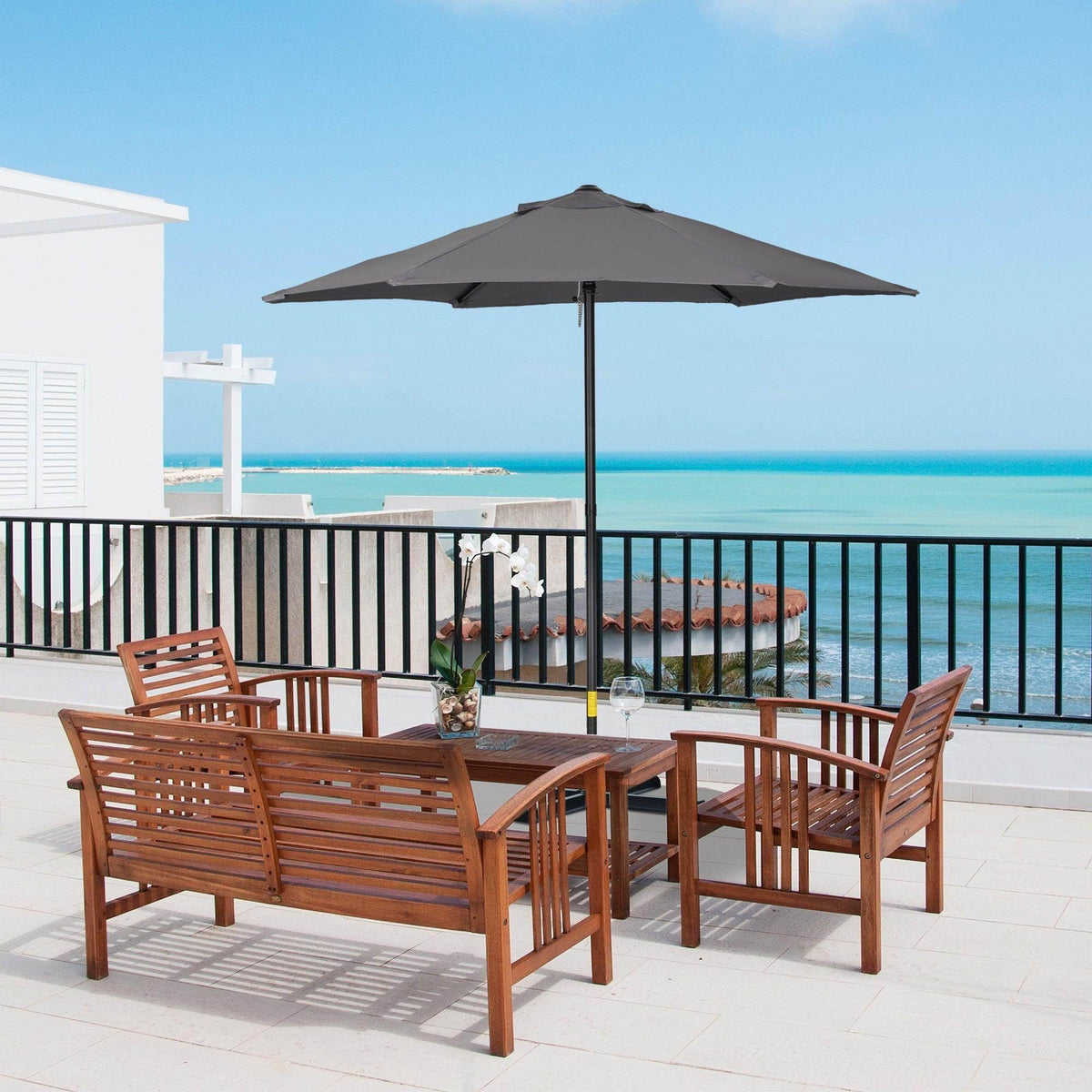 Dark gray patio umbrella with open canopy and straight center pole