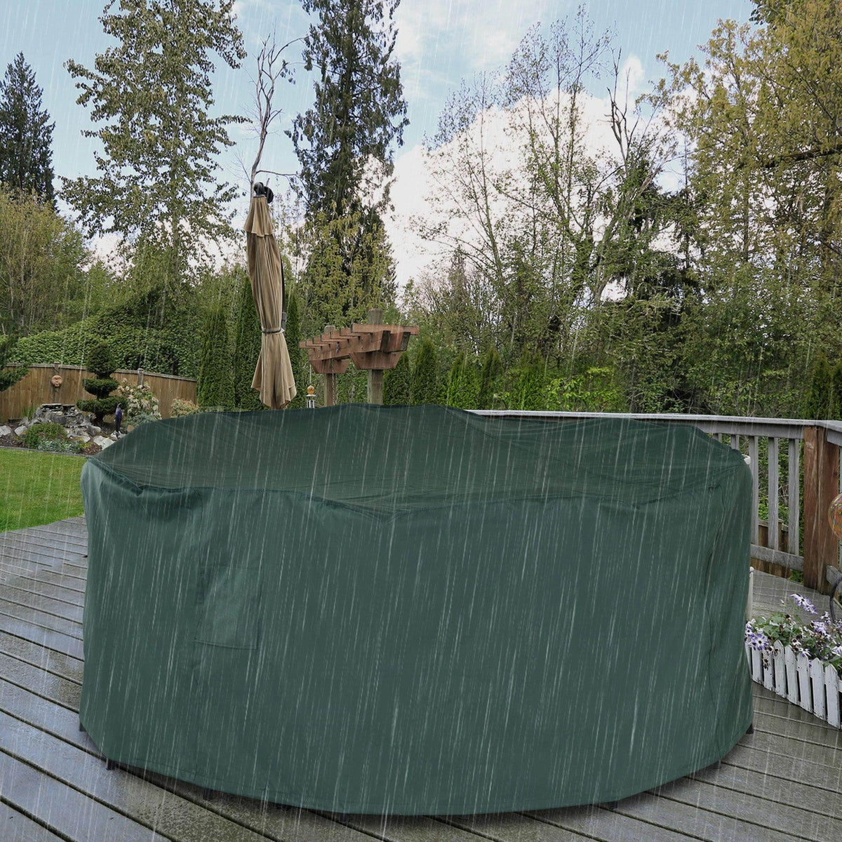 Dark green round patio furniture cover with fitted wrap and smooth top surface