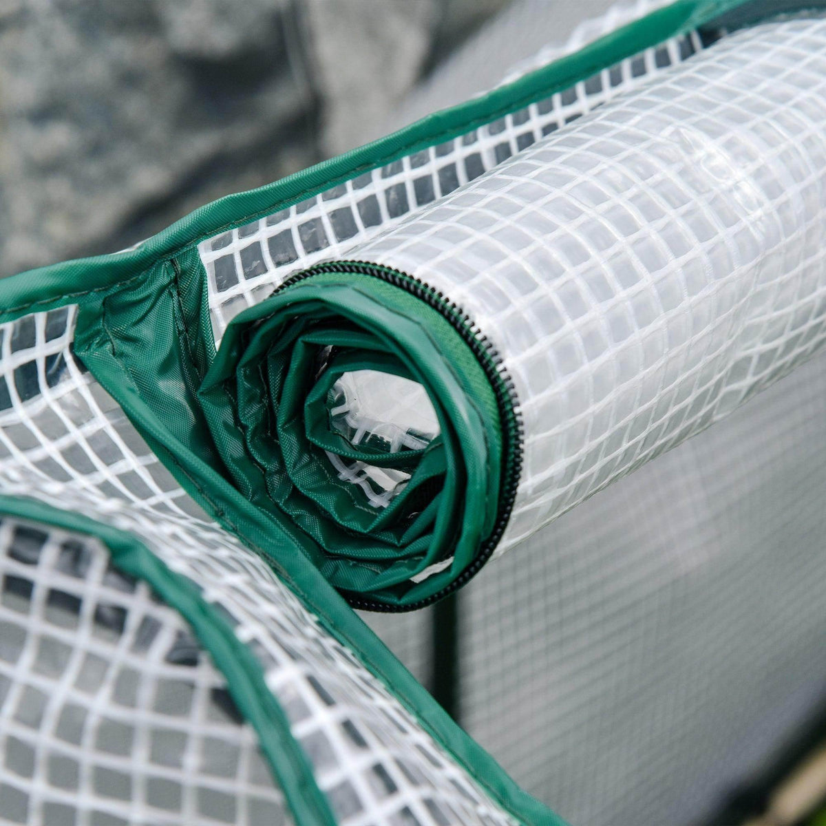 Rolled greenhouse cover fabric, white mesh with green edging and zipper trim