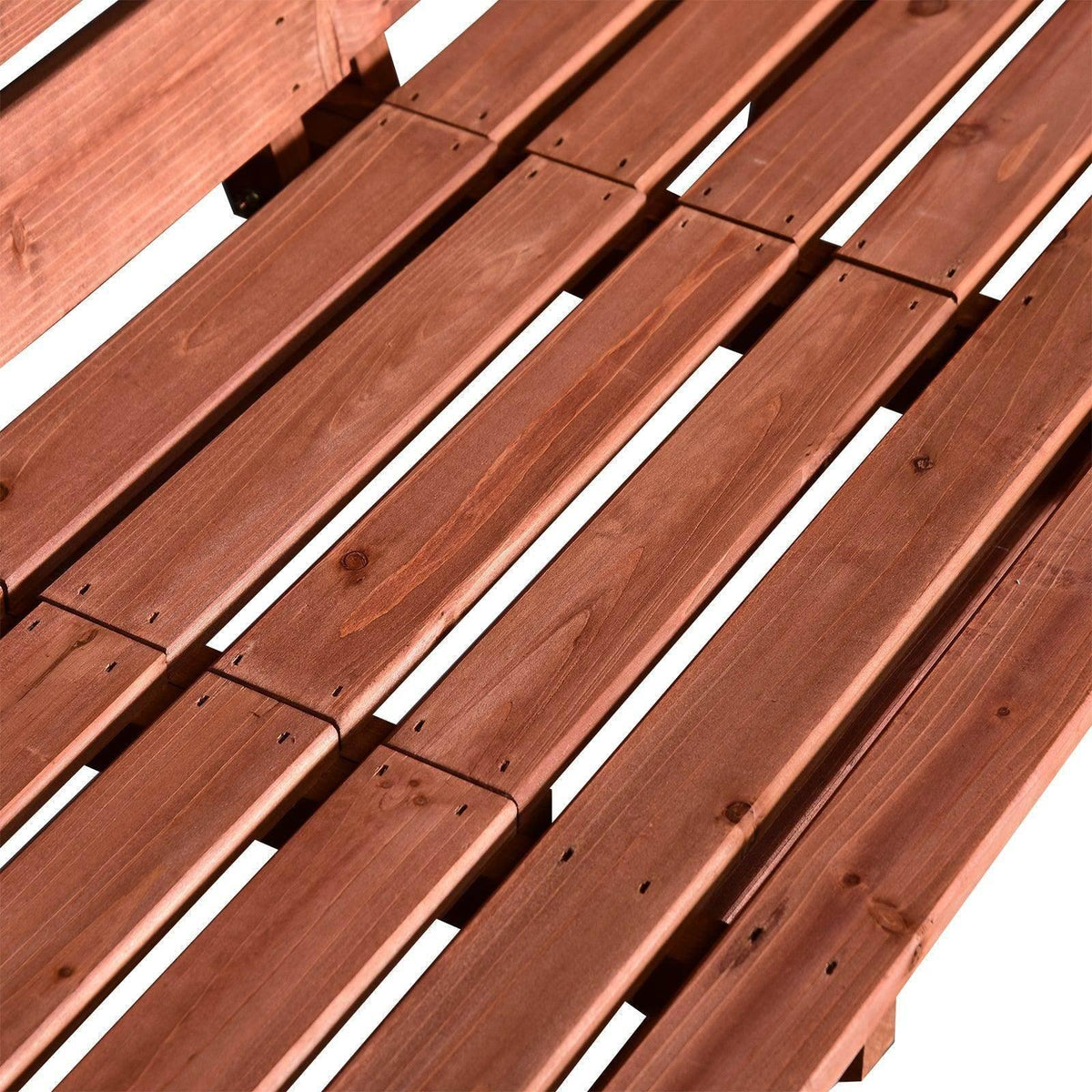 Close-up of red-brown wooden slat bench surface with visible grain