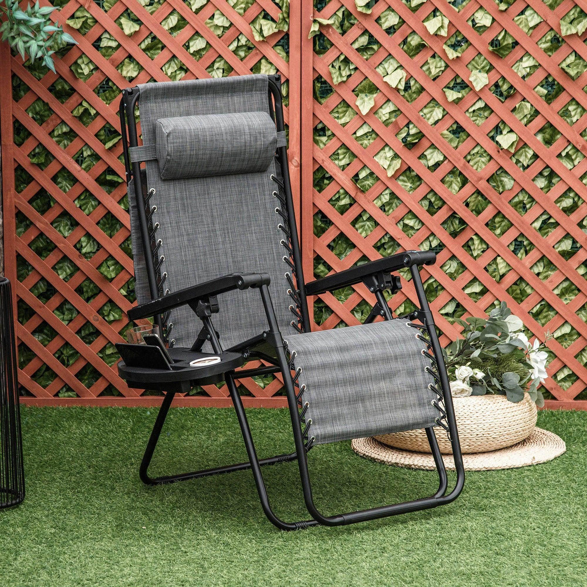 Grey zero-gravity reclining chair with black frame and padded seat back and headrest.