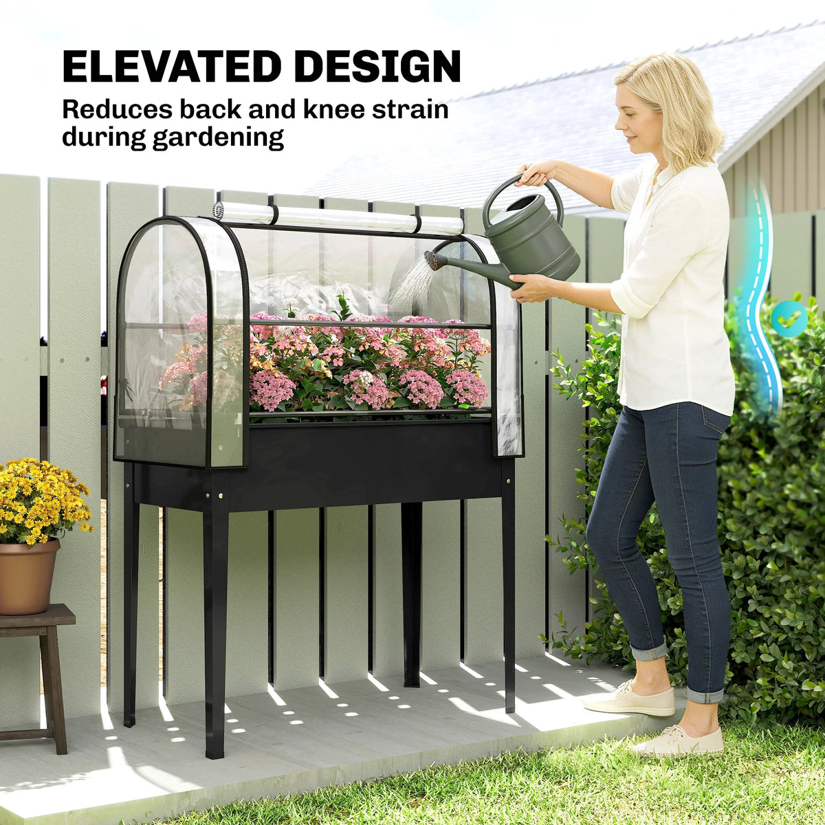Elevated black greenhouse planter with clear cover lifted for easier access