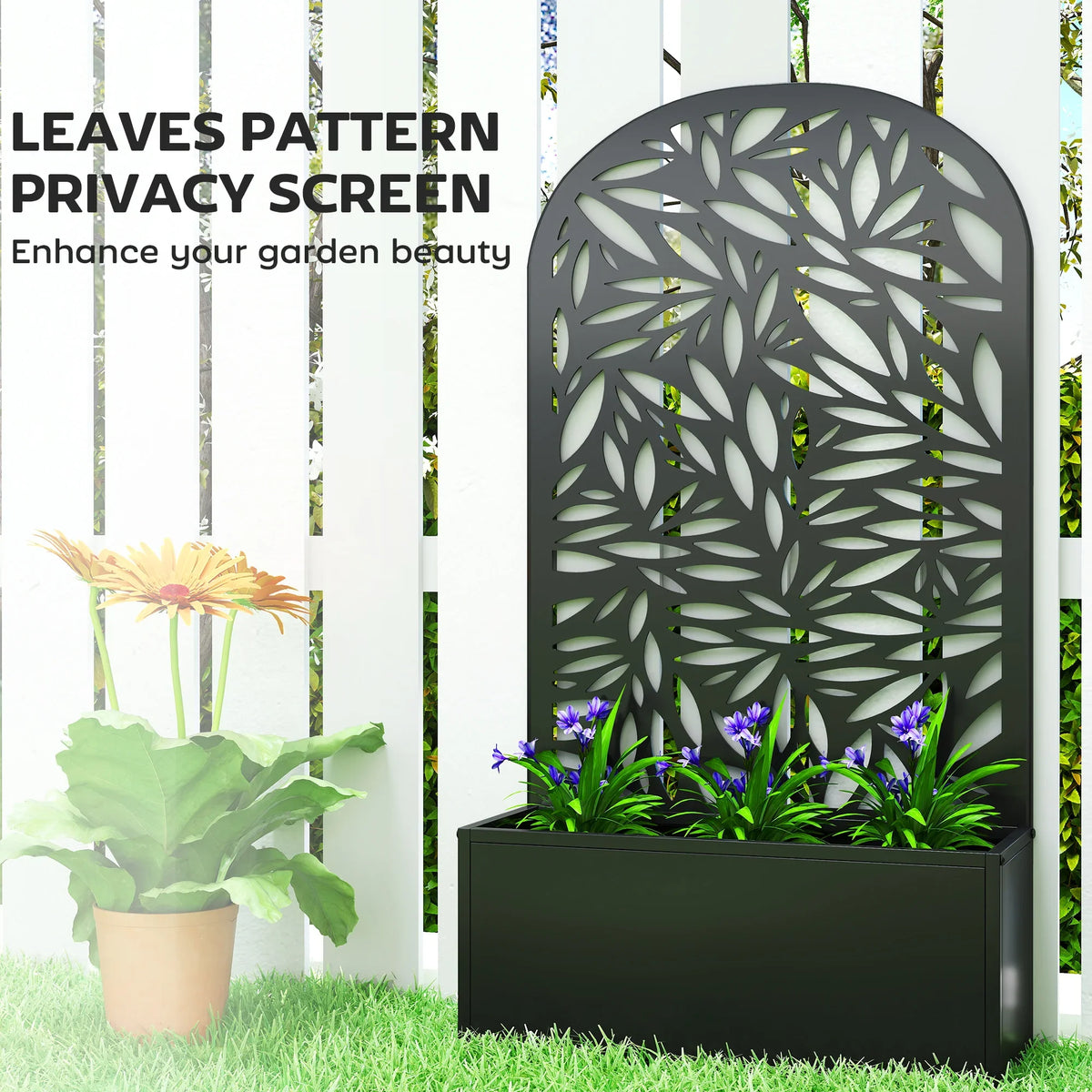Black metal curved privacy trellis and raised planter with leafy cutout backdrop