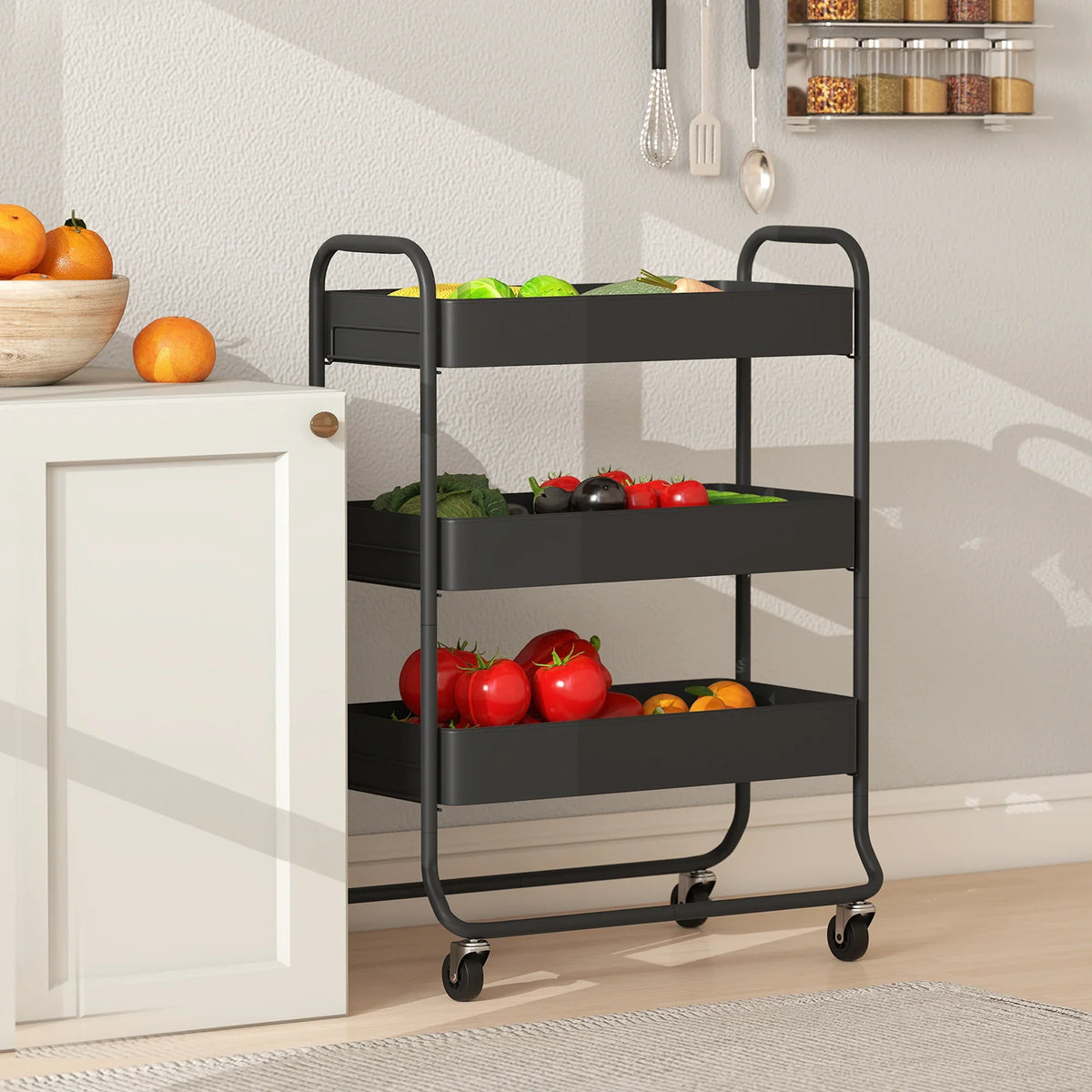 Black 3-tier utility trolley with mesh shelves holding fruits and vegetables