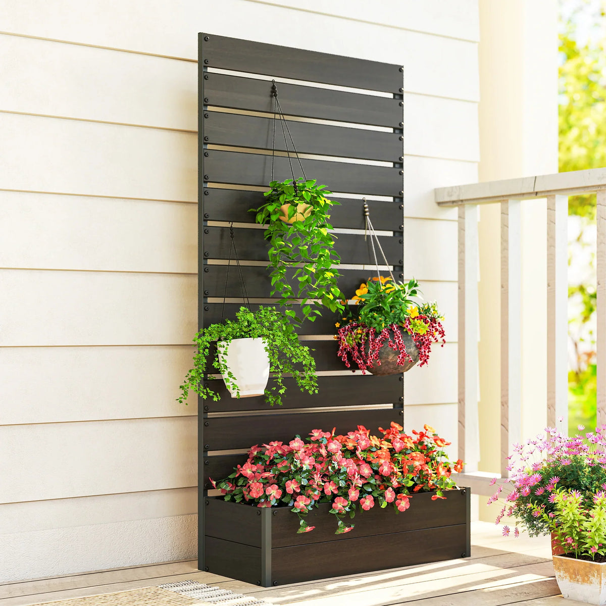 Raised trellis planter along a wall with three plant boxes and climbing trellis slats.