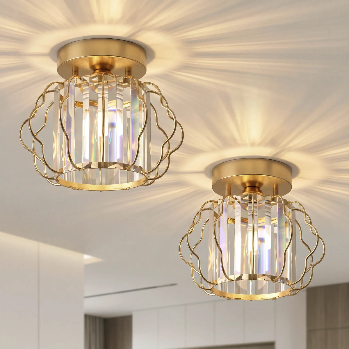 Two gold semi-flush ceiling lights with clear crystal bar cages and glowing bulbs