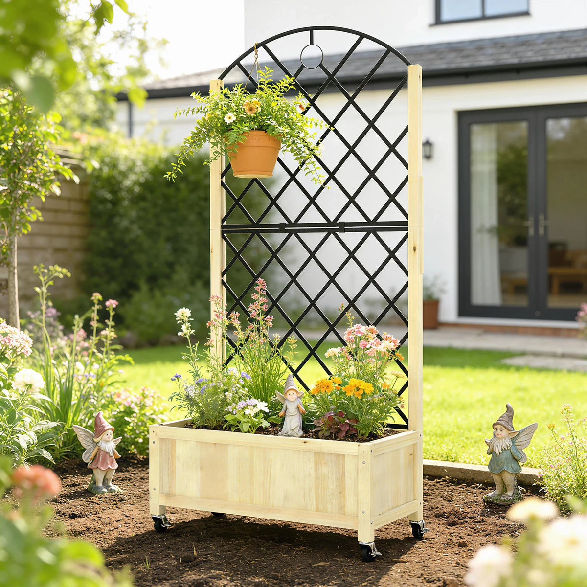 Natural wood raised planter with black lattice trellis and garden flowers in yard