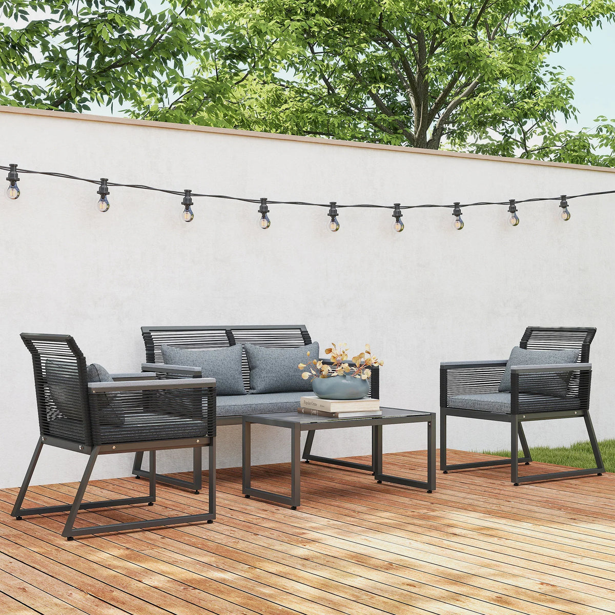 Charcoal grey patio seating set with two armchairs, loveseat, and square coffee table