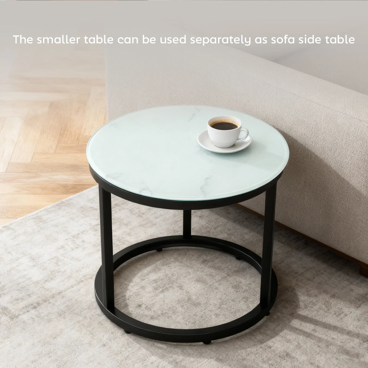 Small round side table with marble-effect tempered glass top and black steel ring frame