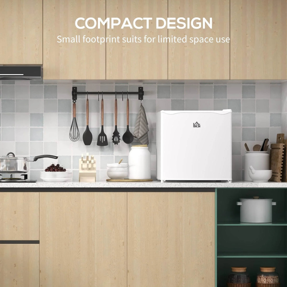 White compact mini freezer in kitchen setting with recessed top handle and front logo.