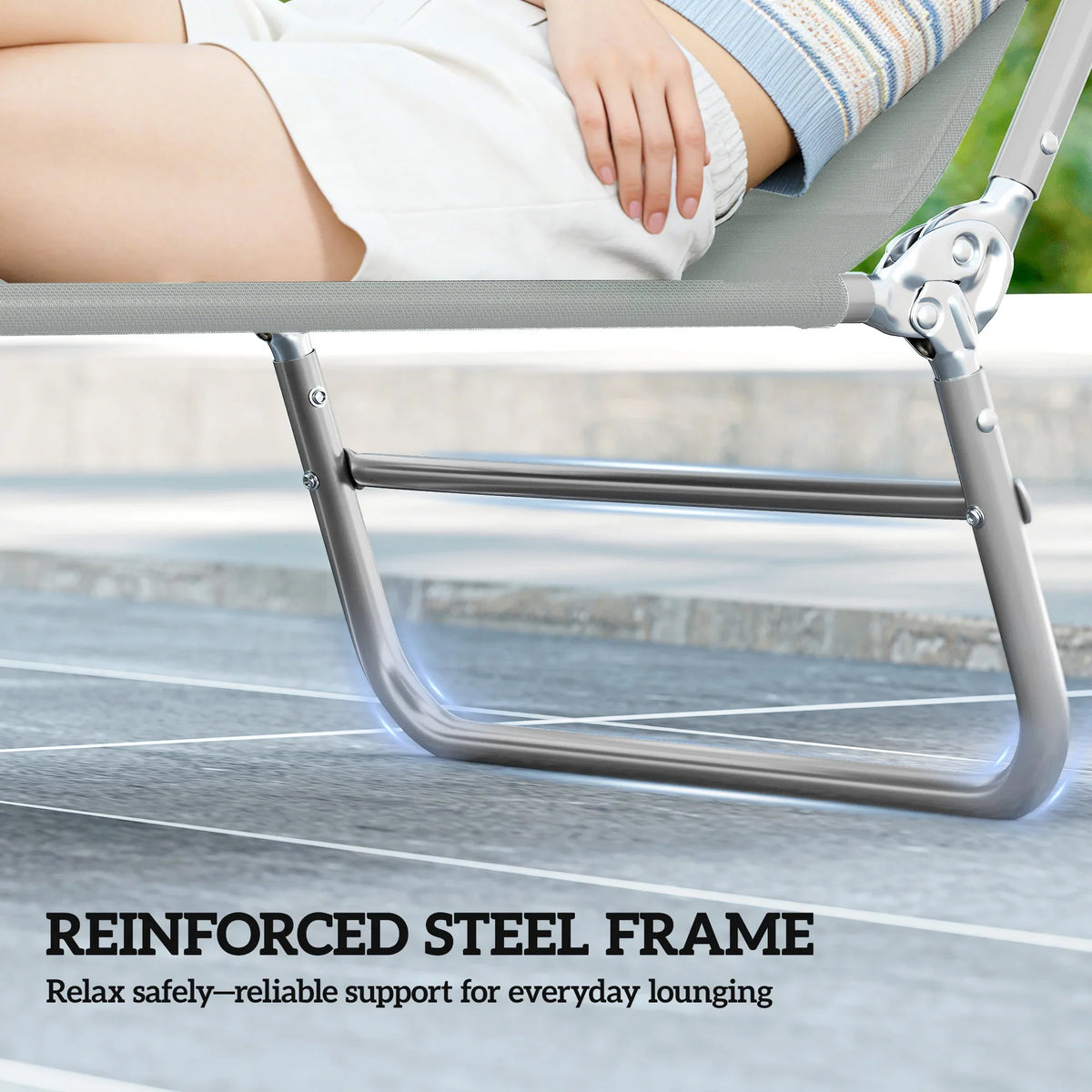 Light grey mesh sun lounger with reinforced steel frame and reclining base.