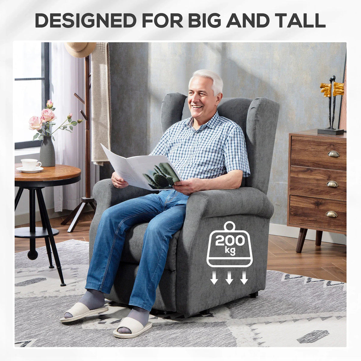 Charcoal grey power lift recliner armchair with high back and padded armrests.