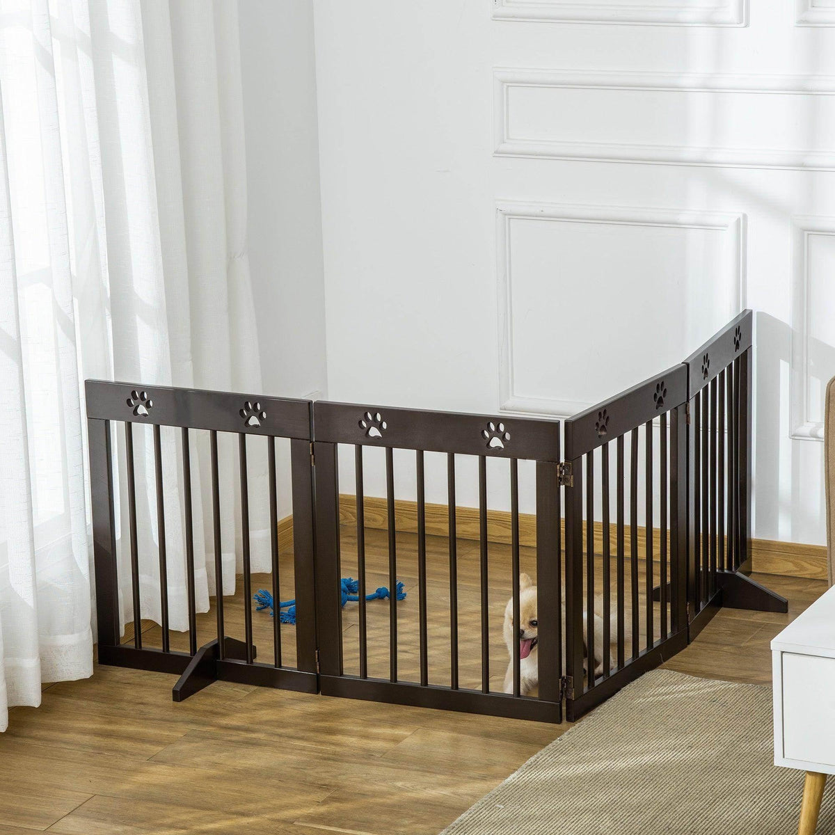 Dark brown folding pet gate with vertical bars set for doorway stairs in home