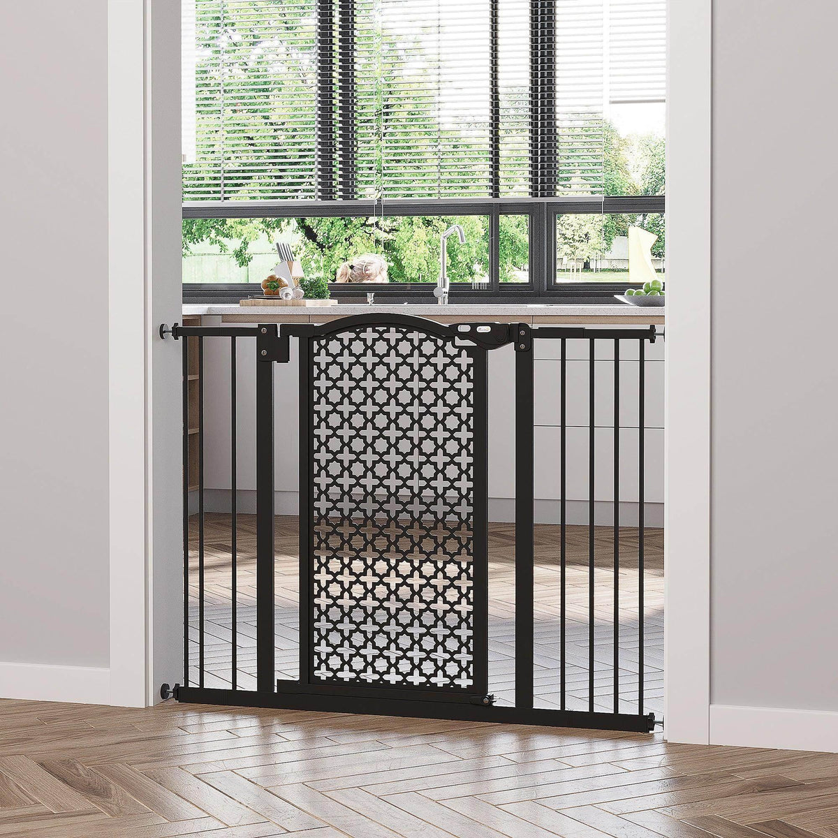 Black pet safety gate with white patterned mesh panel and vertical bars, hinged frame