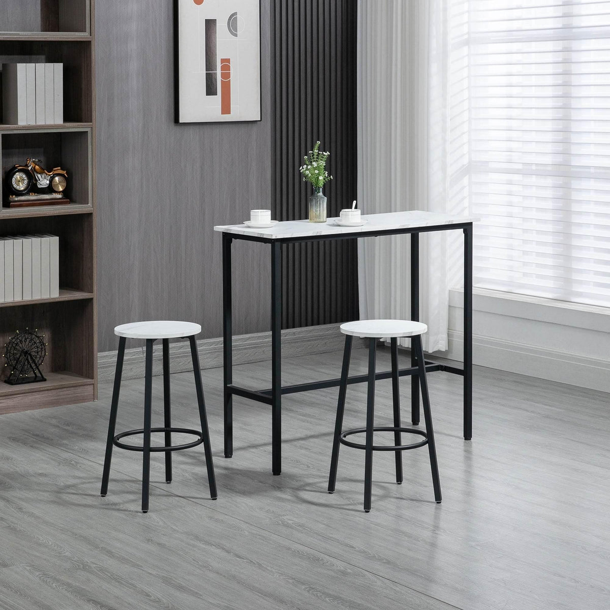 Dining table with marble-effect top and two black bar stools, white round seats