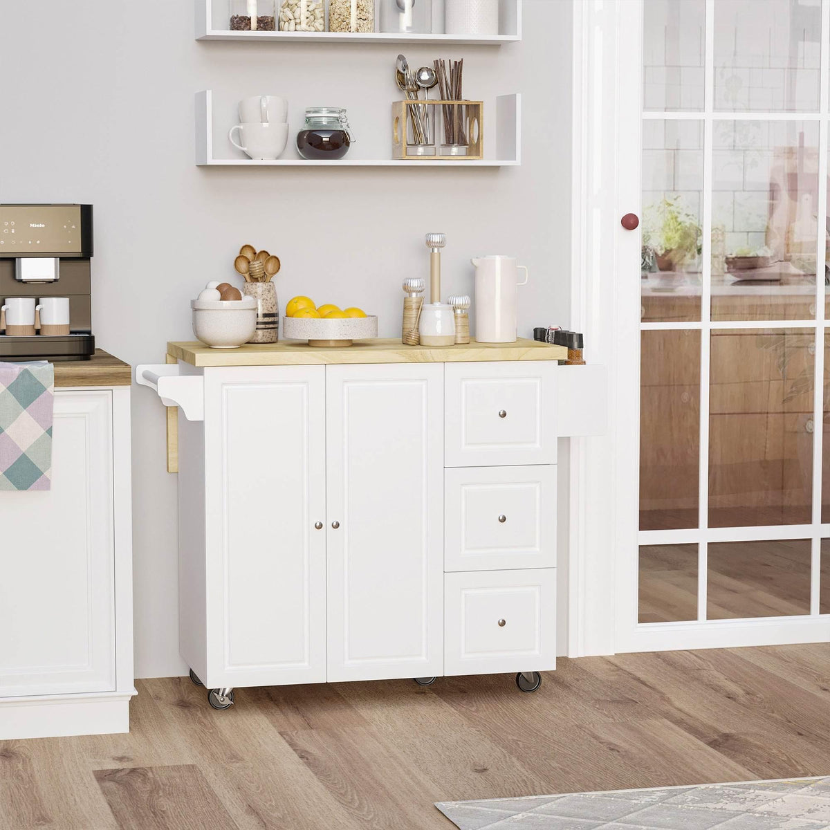 White kitchen island cart with drop-leaf counter, cabinet doors, and storage drawers on wheels