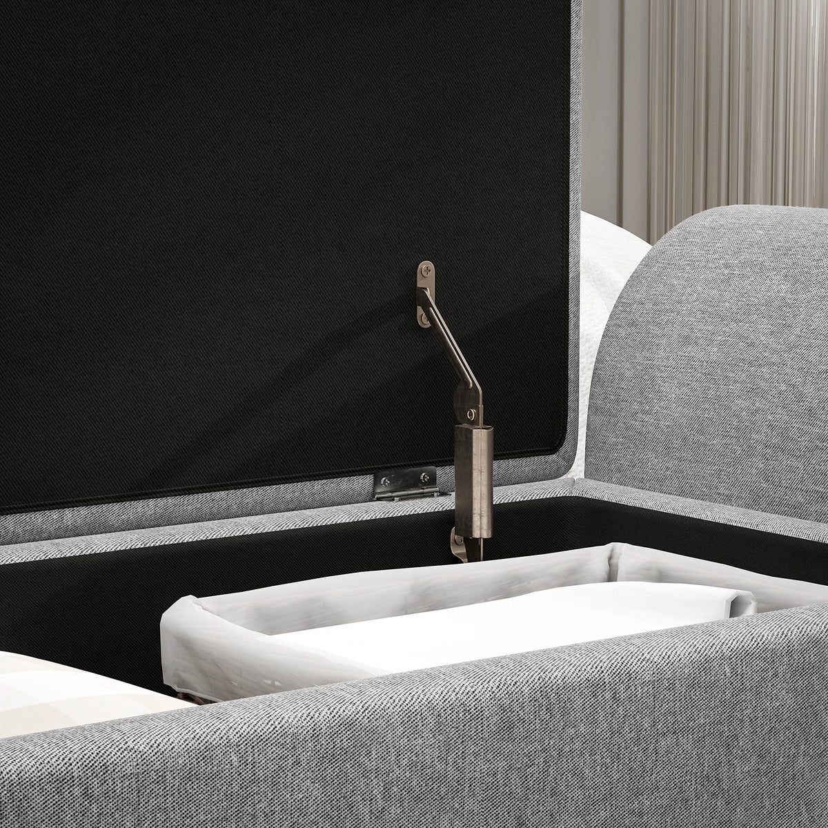 Open lift-top storage ottoman bench showing support strut and dark grey interior