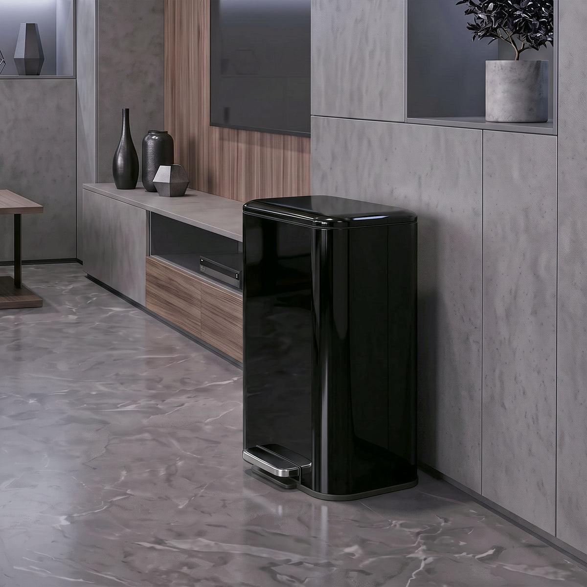 Glossy black kitchen pedal bin with metal pedal and closed lid