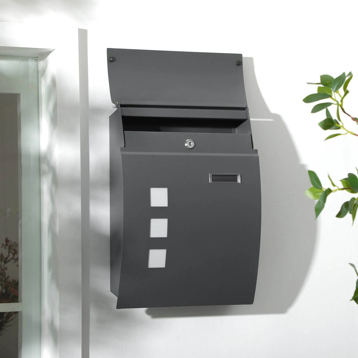 Wall-mounted anthracite mailbox with lock, frosted windows, and nameplate slot