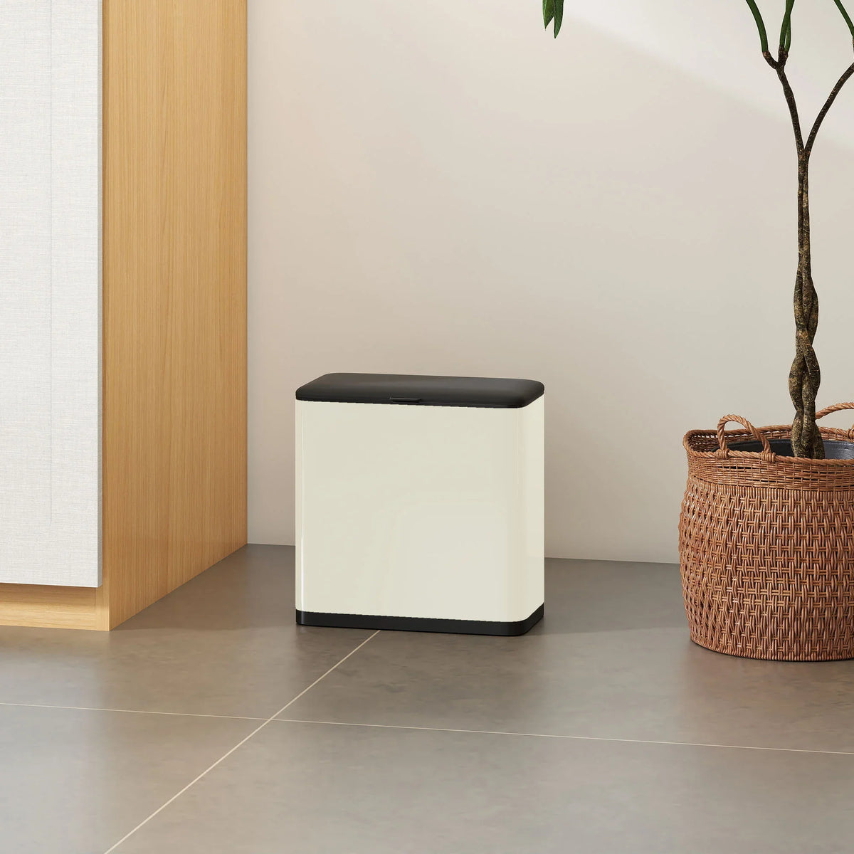 Compact freestanding trash bin with black lid and white body, under cabinet setup