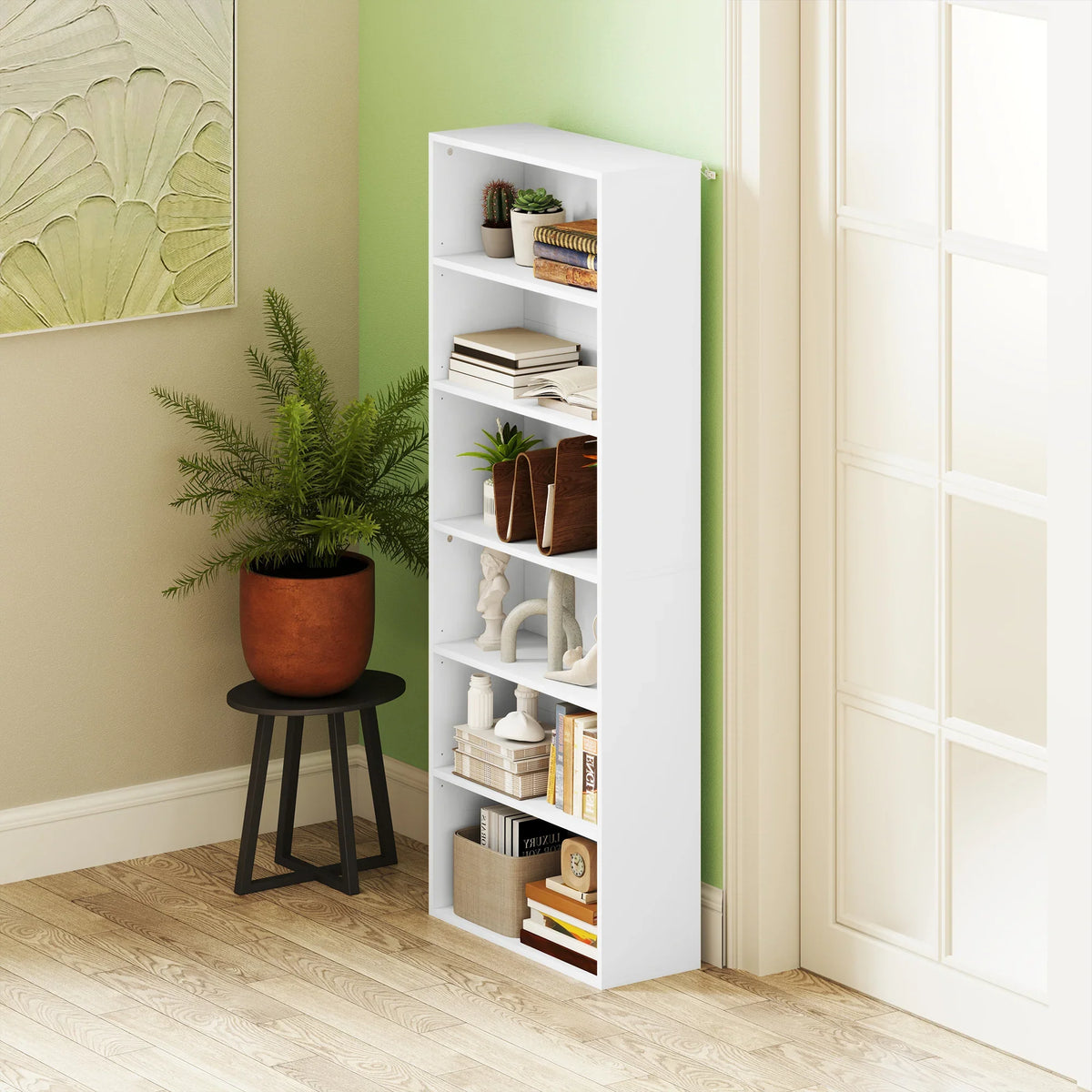 White 6-tier bookcase with open shelves, freestanding beside wall and door